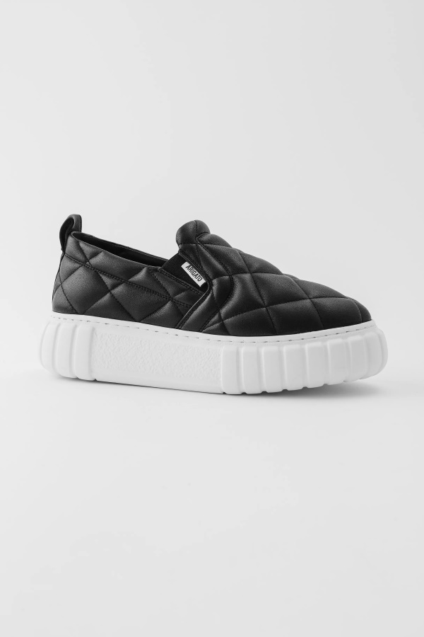 Axel Arigato Haze Slip Mustalla